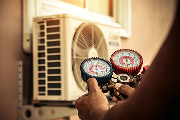 Professional Ac Installation technician working in Winchester, IL